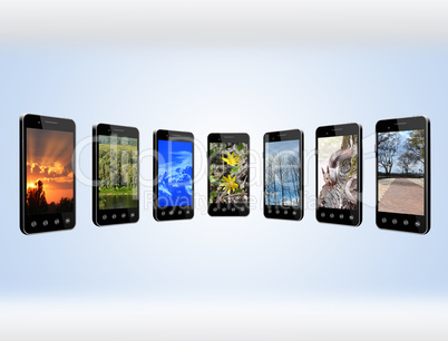 Modern mobile phones with different images