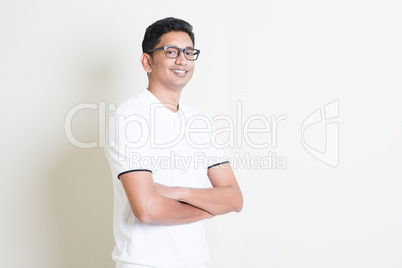 Confident Indian man arms crossed