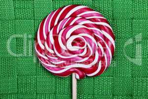 red and white large spiral lollipop