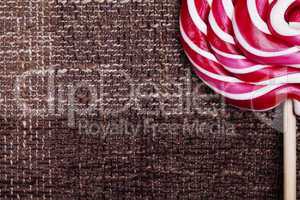 red and white large spiral lollipop