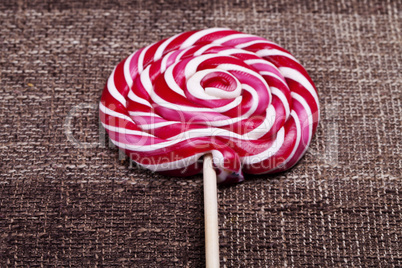 red and white large spiral lollipop