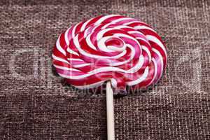 red and white large spiral lollipop
