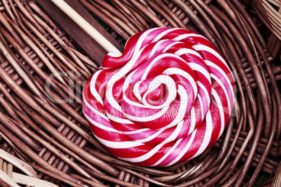 red and white large spiral lollipop