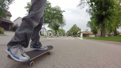 Following Skateboard on Street