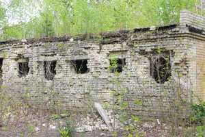 old desolate building with broken windows