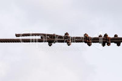 Rusted metal cables fastened together