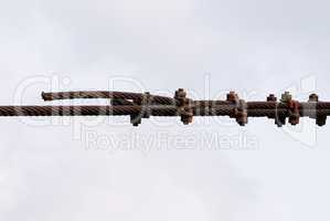 Rusted metal cables fastened together