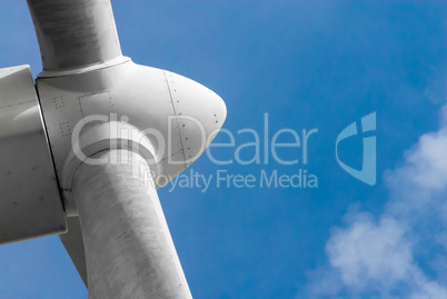 Close-up of white wind turbine propeller on sky