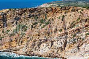 Rocky Beach and Sandstone Cliffs