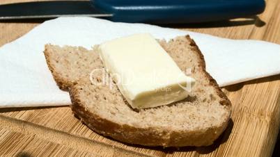 butter melting on a slice of bread