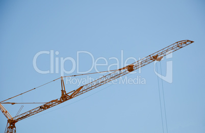Crane arm on the blue sky in Cyprus