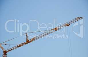 Crane arm on the blue sky in Cyprus