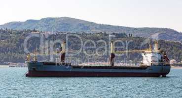 Cargo Ship Sailing in Ocean