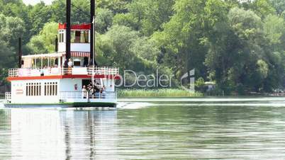 paddle steamer on lake