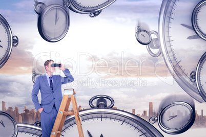 Composite image of businessman looking on a ladder