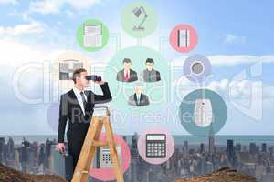 Composite image of businessman looking on a ladder