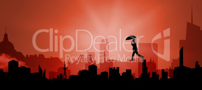 Composite image of businessman stepping with umbrella