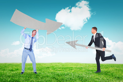 Composite image of businessmen with arrows