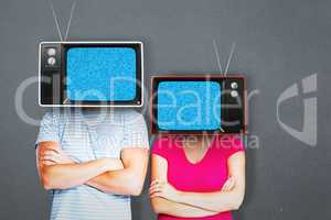 Composite image of young couple with bags over heads