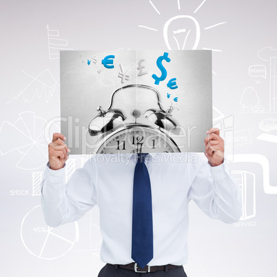 Composite image of tradesman holding blank sign in front of his