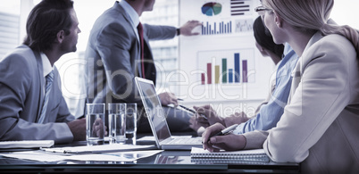 Young business people in board room meeting