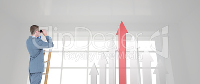 Composite image of businessman looking on a ladder