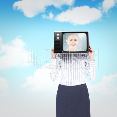 Composite image of businesswoman with box over head