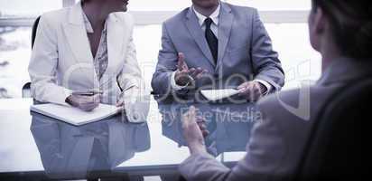 Business partners talking with lawyer