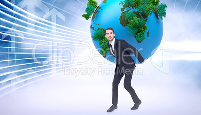 Composite image of businessman carrying the world