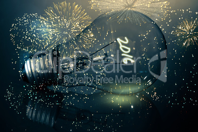 Composite image of colourful fireworks exploding on black backgr