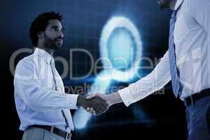 Composite image of young businessmen shaking hands in office