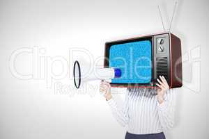 Composite image of businesswoman with box over head and holding