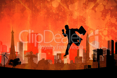 Composite image of businessman silhouette