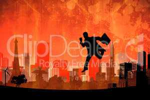 Composite image of businessman silhouette