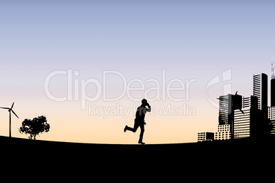 Composite image of businessman silhouette