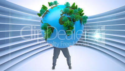 Composite image of businessman carrying the world