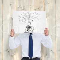 Composite image of tradesman holding blank sign in front of his