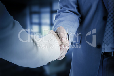 Composite image of people in suit shaking hands