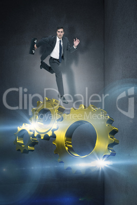 Composite image of stern businessman in a hurry