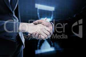 Composite image of close up of two businesspeople shaking their