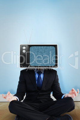 Composite image of calm businessman sitting in lotus pose