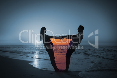 Composite image of couple holding hands on balcony