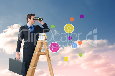 Composite image of businessman looking on a ladder