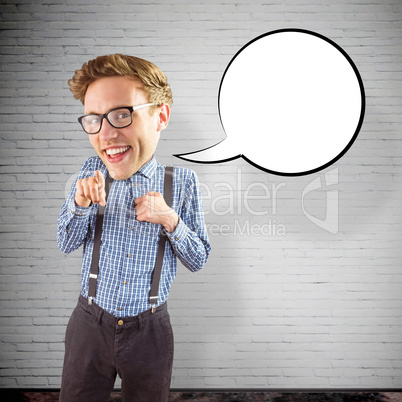 Composite image of geeky businessman pointing