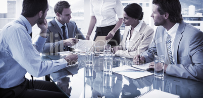 Business people in board room meeting