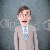 Composite image of geeky businessman