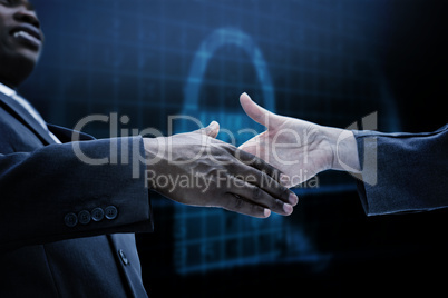 Composite image of businessman going shaking a hand