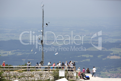 Visitors at a viewing platform from a mountain top