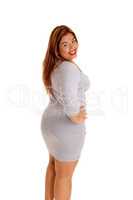 Pretty woman in tight gray dress.