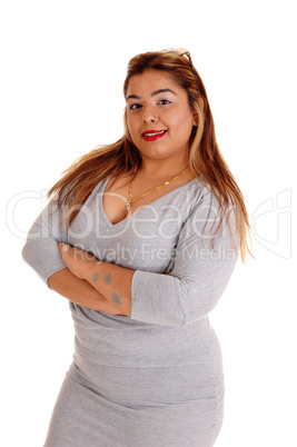 Woman standing with her arms crossed.